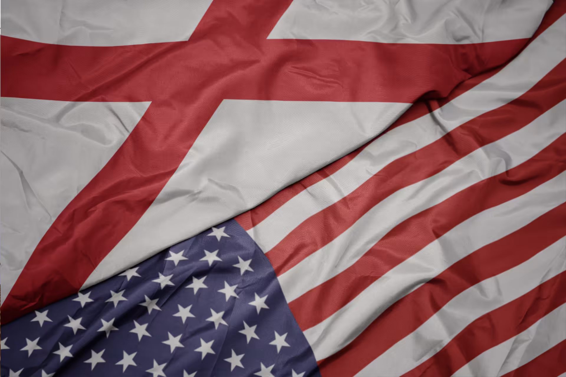 American and Alabama state flags waving together — Sweepers, a locally owned commercial cleaning company serving industries across Northeast Alabama
